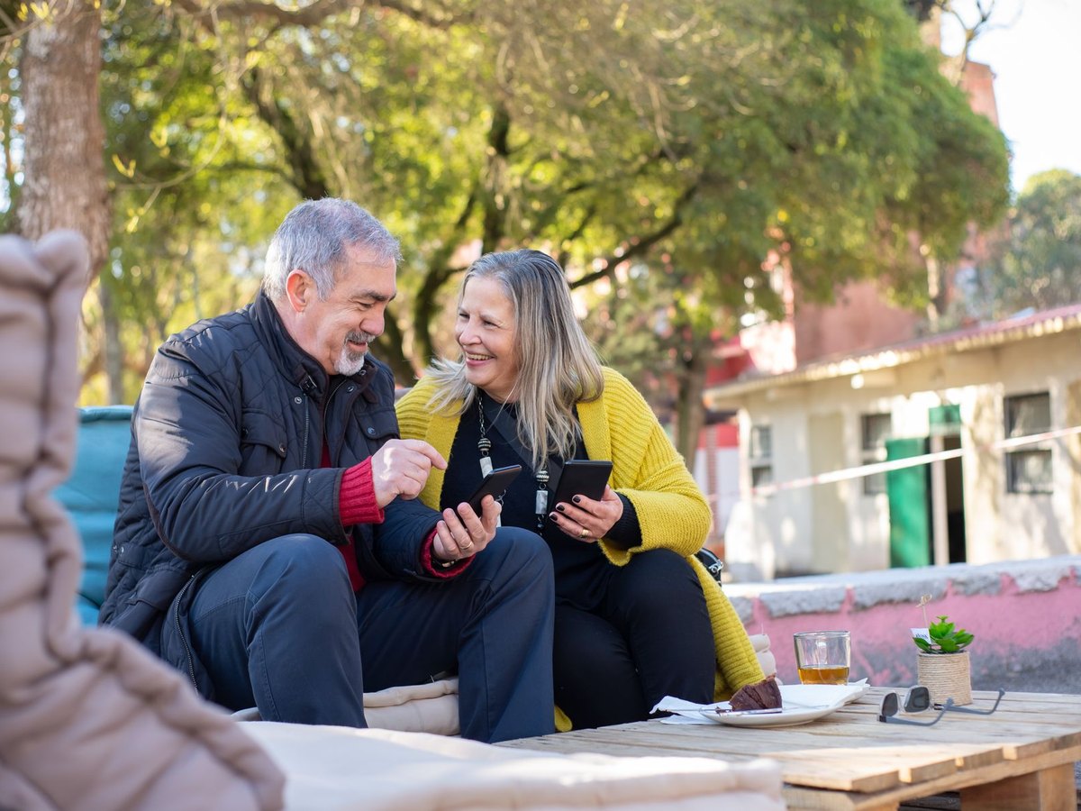 Smiling senior couple relaxing outdoors