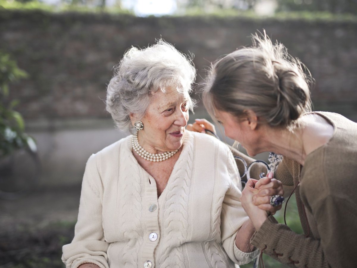 Two longtime friends sharing a laugh
